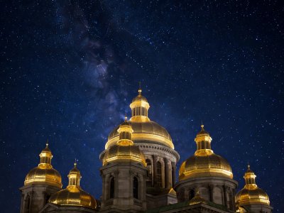 Cluster of glazed candy domes against a starry sprinkle sky