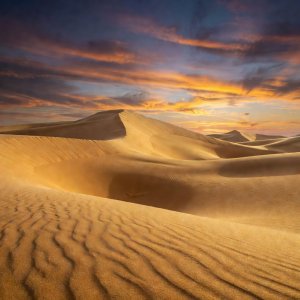 Golden sugar dunes at twilight
